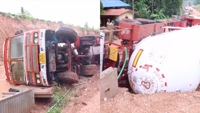 റോഡ് പണിയിൽ വഴി തെറ്റി, മഴയിൽ ടയർ മണ്ണിലേക്ക് താഴ്ന്നു; തിരുവനന്തപുരത്ത് ഗ്യാസ് ടാങ്കർ ലോറി മറിഞ്ഞ് അപകടം