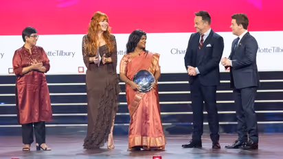 A pink e-rickshaw driver from Uttar Pradesh wins UK’s royal award