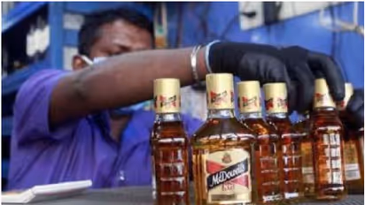Is Karnataka government considering third liquor price hike within one year?
