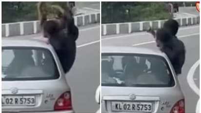 ഓടുന്ന കാറിൽ അഭ്യാസ പ്രകടനങ്ങളുമായി യുവതിയും യുവാവും; ഡ്രൈവറുടെ ലൈസൻസ് സസ്പെൻഡ് ചെയ്യുമെന്ന് എംവിഡി