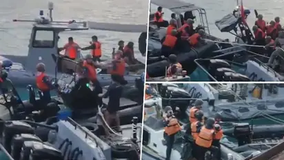 Chinese coast guard sailors wield knives, axe in disputed sea clash with Philippines; WATCH dramatic videos