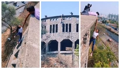 'എല്ലാം റീൽസിന് വേണ്ടി'; കെട്ടിടത്തിന്‍റെ മുകളിൽ നിന്നും ഒറ്റക്കൈയിൽ തൂങ്ങിക്കിടക്കുന്ന പെണ്‍കുട്ടിയുടെ വീഡിയോ