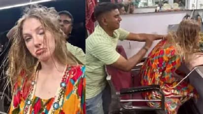 മുംബൈയിലെ ബാർബർ ഷോപ്പിൽ റഷ്യൻ യുവതിക്ക് തല മസ്സാജിം​ഗ്, വൈറലായി വീഡിയോ