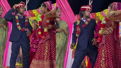 മുടിക്കുത്തിന് പിടിച്ച് ലഡു കഴിപ്പിക്കാൻ വരൻ, കരണത്താഞ്ഞടിച്ച് വധു; എന്തൊക്കെയാടാ ഇത്?