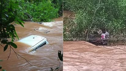 കാര് പുഴയിലേക്ക് മറിഞ്ഞു; മരണത്തിനും ജീവിതത്തിനുമിടയിൽ മരത്തിൽ അള്ളിപ്പിടിച്ച് 2 യാത്രക്കാര്; രക്ഷപ്പെടുത്തി