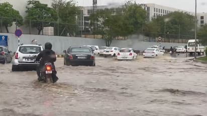 Delhi-NCR drenched: Heavy rains flood roads, submerge cars, and slow traffic (WATCH)