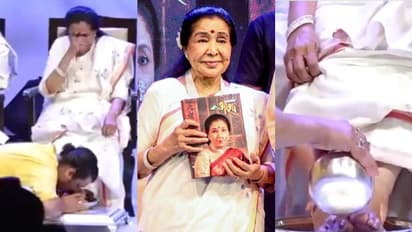 WATCH VIDEO: Asha Bhosle launches her biography 'Swarswamini Asha', Sonu Nigam washes and kisses her feet
