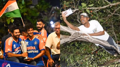 മരംകയറിയ ആവേശം, ഇന്ത്യൻ ടീമിന്‍റെ വിക്ടറി പരേഡിനൊപ്പം വൈറലായി  ആരാധകൻ; പ്രതികരിച്ച് രോഹിത്തും കോലിയും