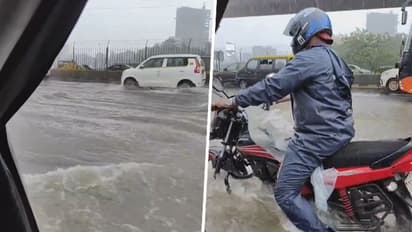Severe rainfall grips Mumbai: Train services suspended, roads flooded (WATCH)
