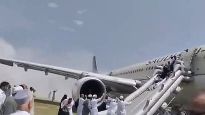 Saudi Airlines with 297 aboard catches fire at Peshawar airport; evacuation videos go viral (WATCH)