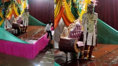 കൊടുംമഴ, മുഖഭാവം പോലും മാറാതെ മഴയത്ത് നിൽക്കുന്ന വരൻ, വൈറലായി വീഡിയോ