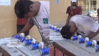  Muhammad Rashid Sets New Guinness World Record for Crushing Cans with His Head [watch]