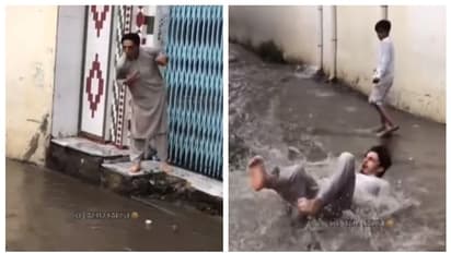 വെള്ളം ചവിട്ടാതെ റോഡ് മുറിച്ച് കടക്കാനായി ചാടി, പക്ഷേ, നടുവുംതല്ലി നടുറോഡില്‍; വീഡിയോ വൈറല്‍ 