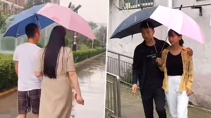Monsoon: Lovey-dovey people, here is 'Couple Umbrella' just for you guys; check out THIS viral video