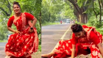 എന്റമ്മോ ഇപ്പോ ഇടിച്ചേനെ; റോഡരികിൽ റീൽ ഷൂട്ടിംഗ്, ചുവടു പിഴച്ച് വീണ് യുവതി, വീഡിയോ