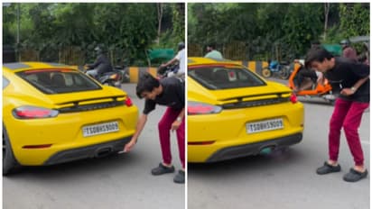 WATCH: Man uses Porsche exhaust to light cigarette: shocking results captured on video