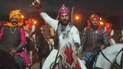 Chhaava: Vicky Kaushal plays Chhatrapati Sambhaji Maharaj; dressed in period armour, faces armed soldiers