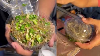 जिंदा मछली को नमक-मिर्च लगाकर खा जाते हैं यहां के लोग-Video Viral