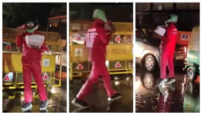 പെരുമഴ, രാത്രി, ഒരു കൈയിൽ ഓർഡർ, മറുകൈയിൽ ഫോൺ; ട്രാഫിക് ജാമിനിടെ ഓർഡർ ചെയ്തയാളെ തപ്പി ഡെലിവറി ഏജന്റ്; വീഡിയോ