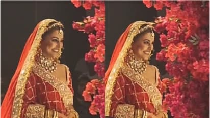 Hina Khan walks on the ramp amid breast-cancer treatment; stuns in a red bridal look - WATCH