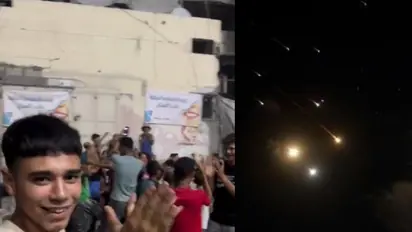 Palestinians in Gaza celebrate Iran's missile attack on Israel as tensions escalate; WATCH viral videos