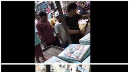 Delhi HORROR! Man brandishes knife, threatens to stab woman during argument as crowd watches (WATCH)