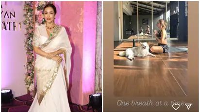 'One breath at a time...', Malaika Arora shares photo of her doing Yoga with her pet dog