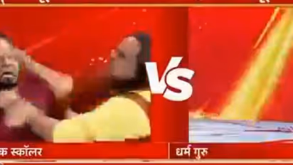 Drama on national TV debate as Acharya & Maulana rain blows, hurl abuses over Lord Krishna insult (WATCH) 