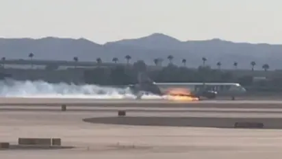 Frontier Airlines flight catches fire while landing at Las Vegas airport; dramatic video goes viral (WATCH)