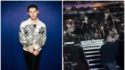 WATCH: Nick Jonas runs for safety during Prague concert after laser light was aimed at him