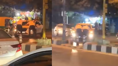 Delhi: Two traffic cops cling to car bonnet as driver takes U-turn, speeds away; SHOCKING video emerges| WATCH