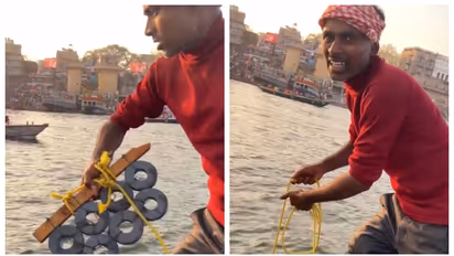 ഗംഗയിലേക്ക് കാന്തം വലിച്ചെറിഞ്ഞ് യുവാവ്; തിരികെ എടുക്കുന്നത് കുടുംബം പോറ്റാനുള്ള 'പണം'; വീഡിയോ വൈറല്