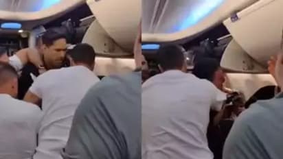 Mid-air horror as flyer wields plastic knife, tries to take crew member hostage & open emergency door (WATCH)