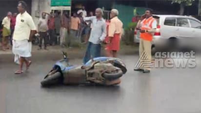 അരികിലൂടെ വന്ന വാഹനത്തിൽ തട്ടി സ്കൂട്ടർ യാത്രികൻ താഴെ വീണു; എതിരെ വന്ന ലോറി കയറി ദാരുണാന്ത്യം
