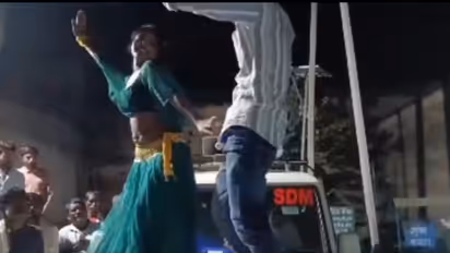 Woman's 'obscene' dance with man on bonnet of SDM's car in UP goes viral; FIR against driver (WATCH)