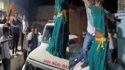 എന്തോന്നടെ ഇത്; എസ്‍ഡിഎമ്മിന്റെ വാഹനത്തിന് മുകളിൽ യുവതിയുടെ ഡാൻസ്, നോട്ടെറിഞ്ഞ് കാഴ്ച്ചക്കാർ, സംഭവം ഝാൻസിയിൽ