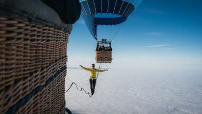 Viral video: German slackliners' walk between hot air balloons at 2.5 km altitude; sets new world record