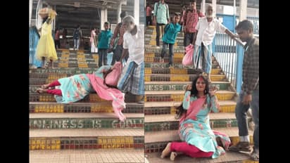 Elderly man rushes to save woman falling from stairs at railway station. But there's a twist (WATCH)