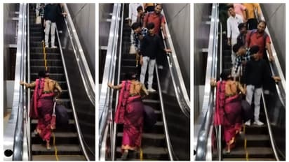 एस्केलेटर पर चढ़ने की कोशिश करती महिला का वीडियो वायरल