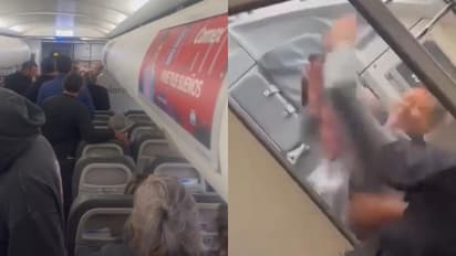 ഭാര്യയ്ക്കും മക്കൾക്കുമൊപ്പം യാത്ര, വിമാനം റാഞ്ചാൻ ശ്രമിച്ച് 31കാരൻ, കീഴ്പ്പെടുത്തി യാത്രക്കാർ - വീഡിയോ