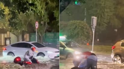 'ഇത് കാണുമ്പോൾ തോന്നുന്നു മനുഷ്യത്വം മരിച്ചിട്ടില്ല'; ഒഴുക്കിൽ പെട്ട് സ്കൂട്ടർ, കൈത്താങ്ങുമായി യുവാക്കള്‍