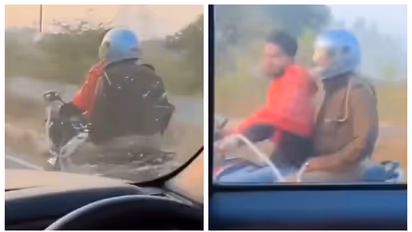 വിലങ്ങണിഞ്ഞ കുറ്റവാളി ഹെല്‍മറ്റില്ലാതെ ബൈക്ക് ഓടിക്കുന്നു; പിന്നില്‍, ഹെൽമറ്റ് വച്ച പോലീസും, വീഡിയോ വൈറൽ 