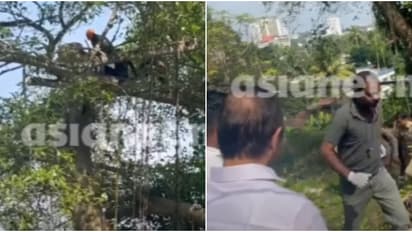 കന്റോൺമെന്റ് ഹൗസിൽ മരംമുറിക്കാൻ വന്നയാളുടെ വിരൽ മരങ്ങള്ക്കിടയില് കുരുങ്ങി;70 അടി ഉയരത്തിൽ നിന്ന് രക്ഷിച്ചു