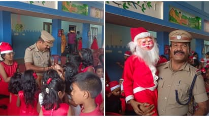 ക്രിസ്മസ് ആഘോഷം ഉദ്ഘാടനം ചെയ്യാനെത്തി സിഐ; പൊലീസ് മാമനെ വളഞ്ഞു പിടിച്ച് കുഞ്ഞ് സാന്താക്ലോസുമാർ