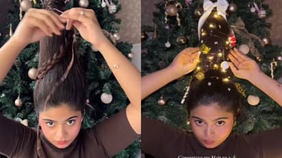 ഹമ്മേ, ശരിക്കും ഞെട്ടി; യുവതിയുടെ തലയിൽ ദേ ഒരു ക്രിസ്മസ് ട്രീ, 'എന്തൊരു ക്യൂട്ട്' എന്ന് കമന്റ്
