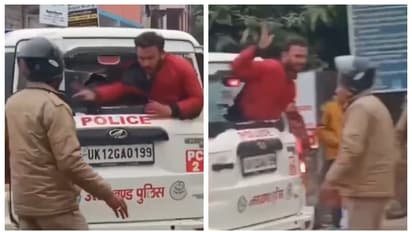 പൂസായാൽ പിന്നെന്ത് പോലീസ്? വാഹനത്തിന്റെ ഗ്ലാസ് തകർത്ത് അതിലൂടെ തലയിട്ട് അസഭ്യം വിളിച്ച് യുവാവ്; വീഡിയോ വൈറൽ