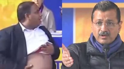 Man bares his swollen belly at Kejriwal's presser, BJP hits back after ex-CM's 'best treatment' promise| WATCH