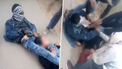 UP SHOCKER! Girl rescued after jilted lover attempts to strangulate her in middle of road in Amroha (WATCH)