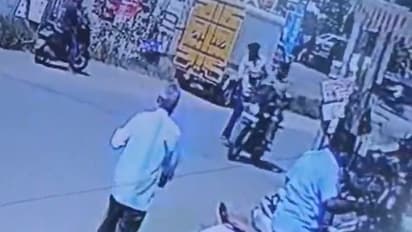 Tamil Nadu: Policeman slaps man for using mobile while crossing road in Coimbatore (WATCH)