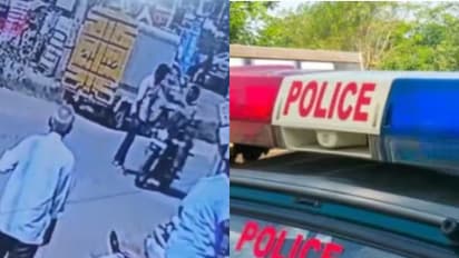 ഫോണിൽ നോക്കി റോഡ് മുറിച്ചു കടന്നു, ഹെൽമറ്റില്ലാതെ ബൈക്കിൽ വന്ന് പൊലീസ് മുഖത്തടിച്ചു; വീഡിയോ കാണാം